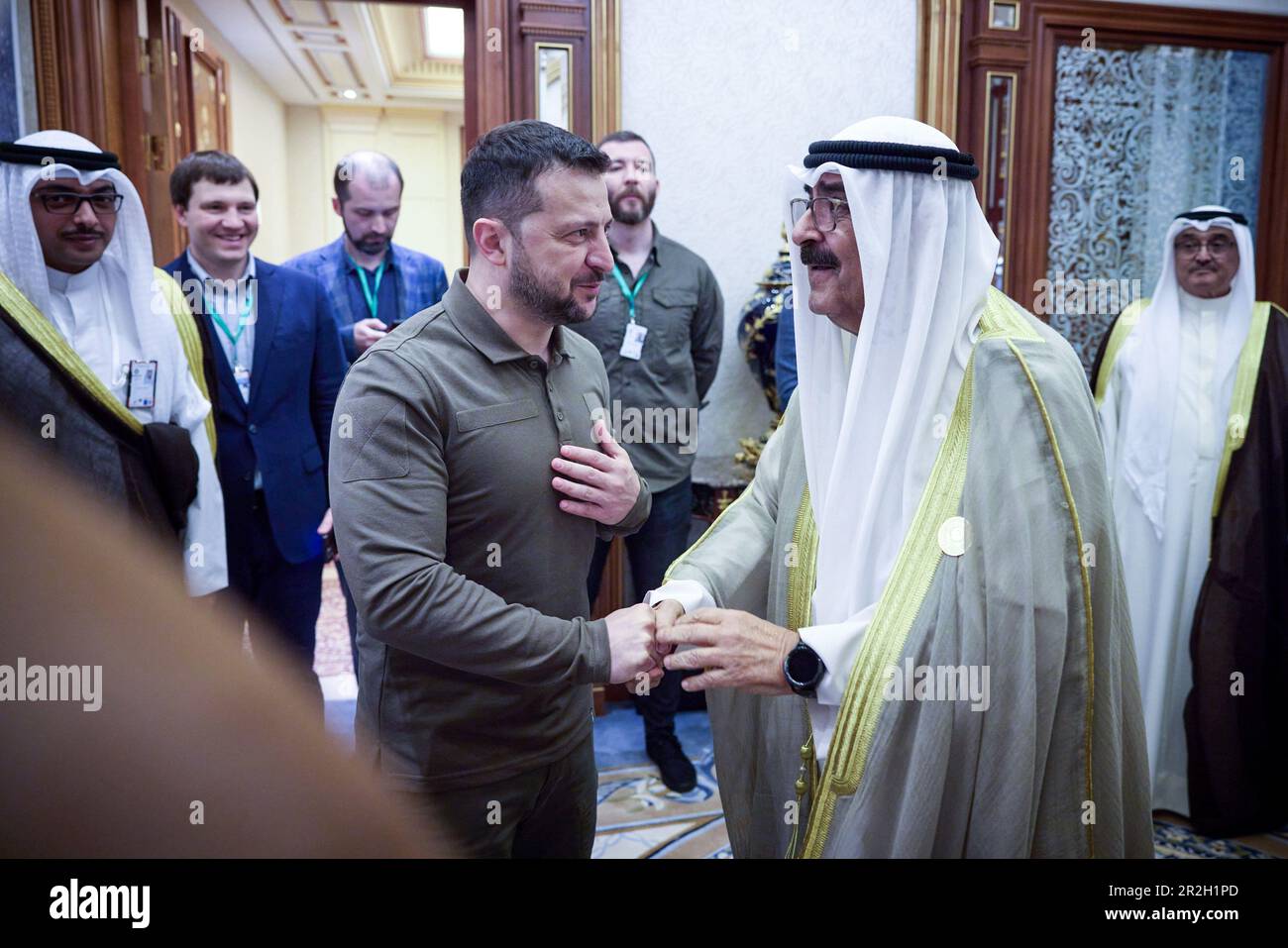 Jeddah, Saudi Arabia. 19th May, 2023. Ukrainian President Volodymyr Zelenskyy, left, greets Kuwait Crown Prince Mishal Al-Ahmad Al-Jaber Al-Sabah, right, before their bilateral meeting on the sidelines of the Arab League Summit, May 19, 2023 in Jeddah, Saudi Arabia. Zelenskyy attended the annual summit meeting as part of a broader pitch for global support against the Russia invasion of Ukraine. Credit: Pool Photo/Ukrainian Presidential Press Office/Alamy Live News Stock Photo