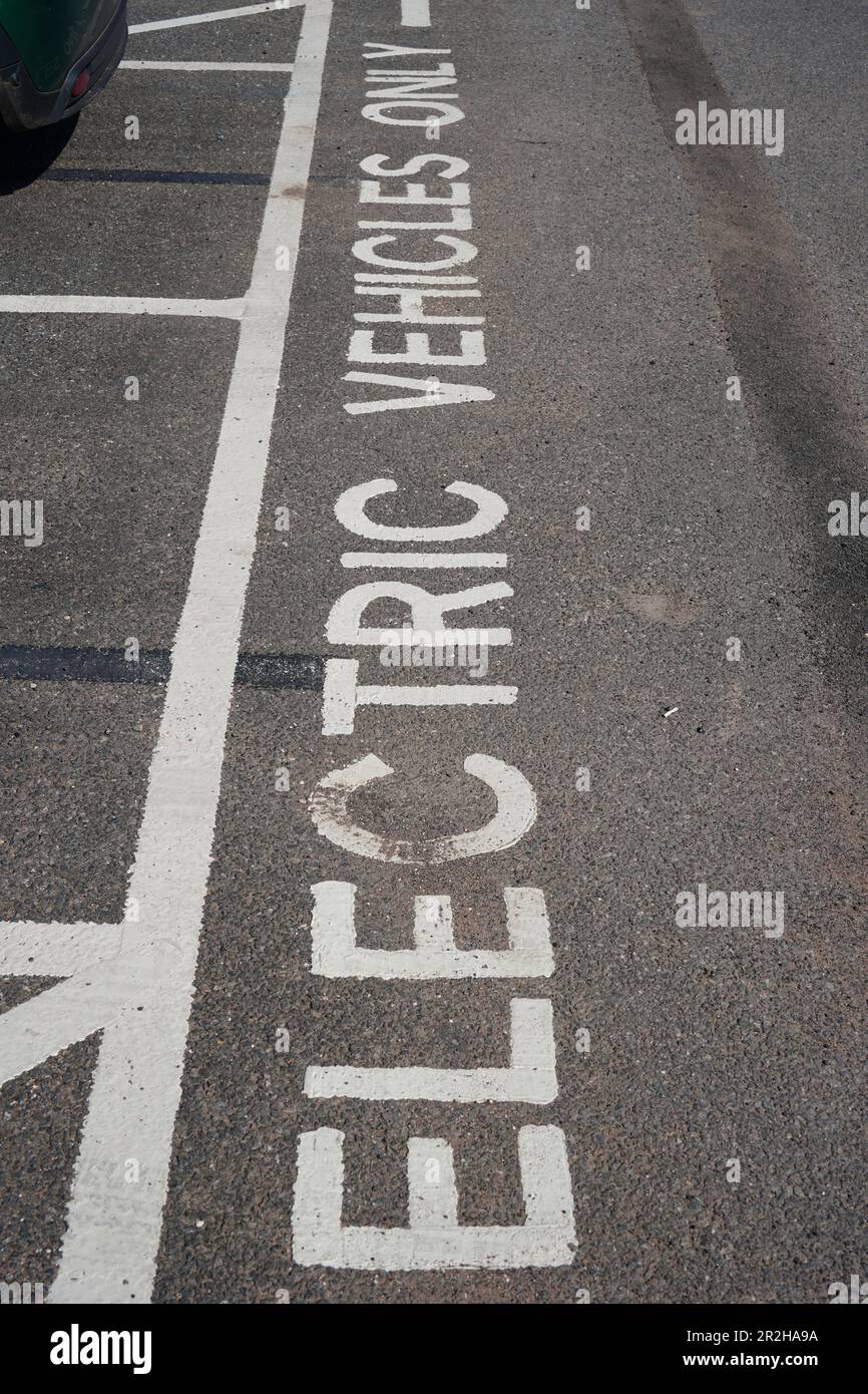 Car park spaces dedicated to electric vehicles only Stock Photo - Alamy