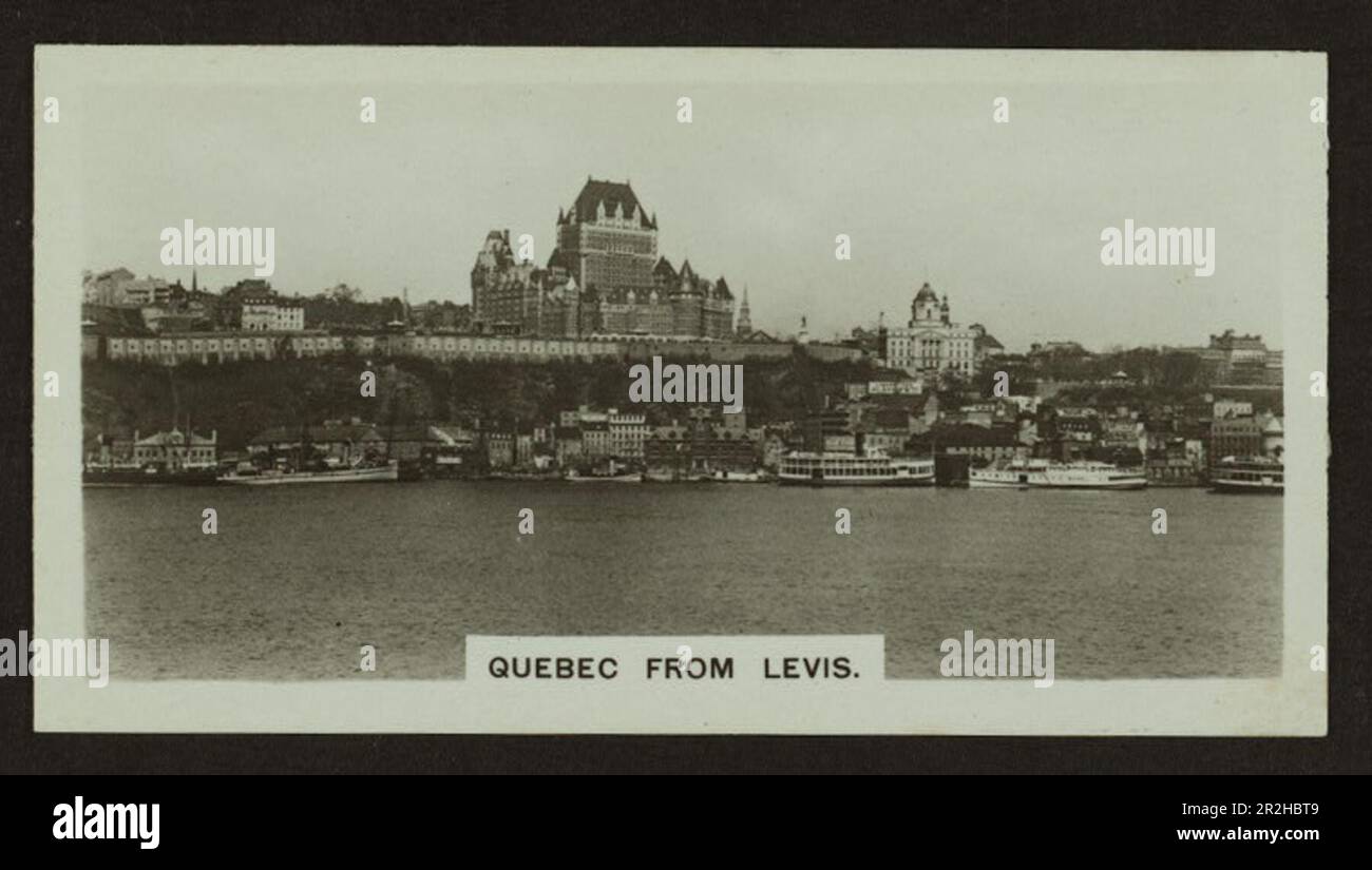 Black and white cigarette card showing Quebec City from Levis on the Saint Lawrence River, ca. 1920s, produced by Westminster Tobacco Company. The Canadian Pacific Railway Chateau Frontenac hotel is prominent. Stock Photo