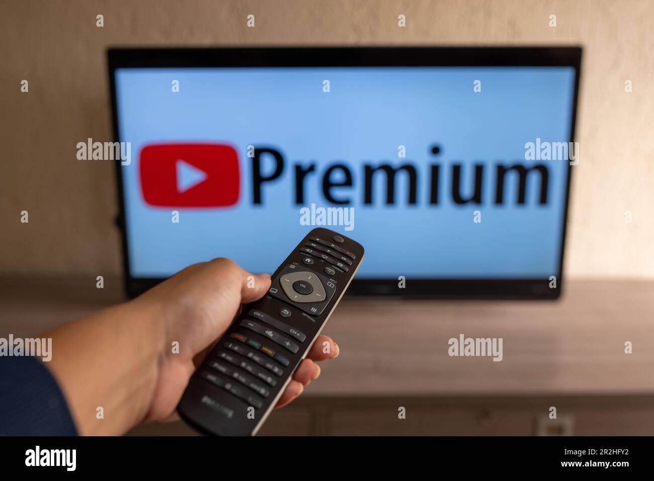 Brazil, Rio de Janeiro - May 19, 2023: Flat-screen TV set displaying logo of youtube premium Stock Photo