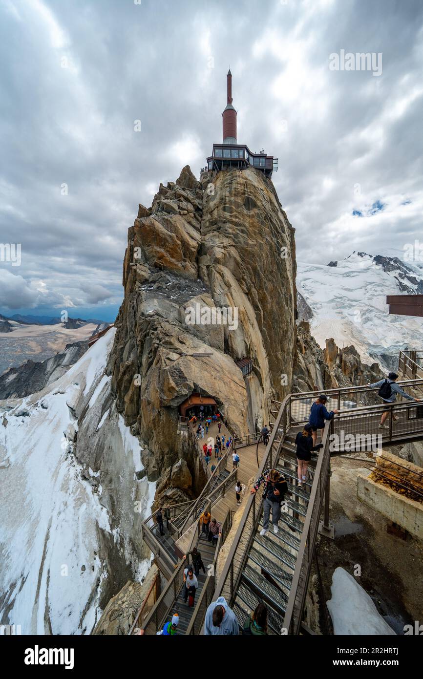 View of Aiguille du Midi with transmission towers and steel structures ...