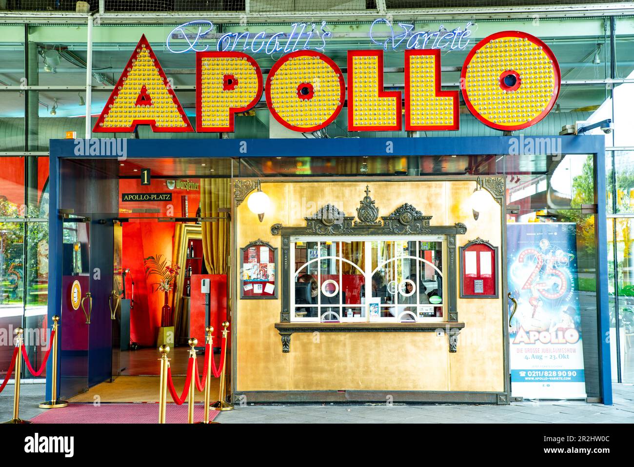 Roncalli's Apollo Variety Theatre perched underneath the Rheinkniebrücke over the Rhine river in Düsseldorf, Germany Stock Photo