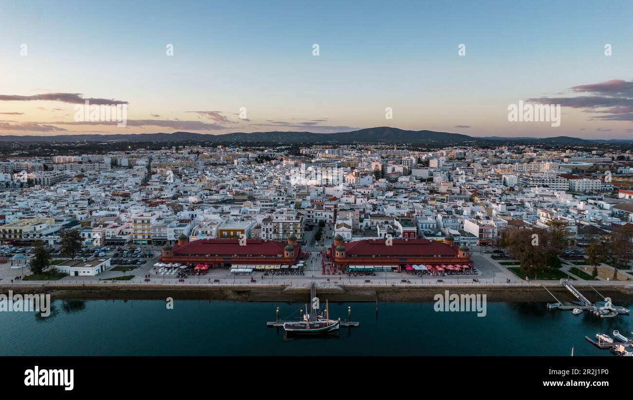 Aerial drone view of Olhao, officially known as Olhao da Restauracao, a city and municipality in the Algarve region, southern Portugal, Europe Stock Photo