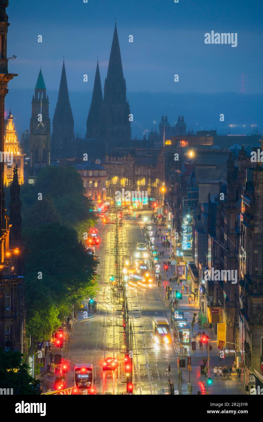 High angle view of Princes Street and St. Mary's Cathedral in background at twilight, UNESCO World Heritge Site, Old Town, Edinburgh, Lothian Stock Photo