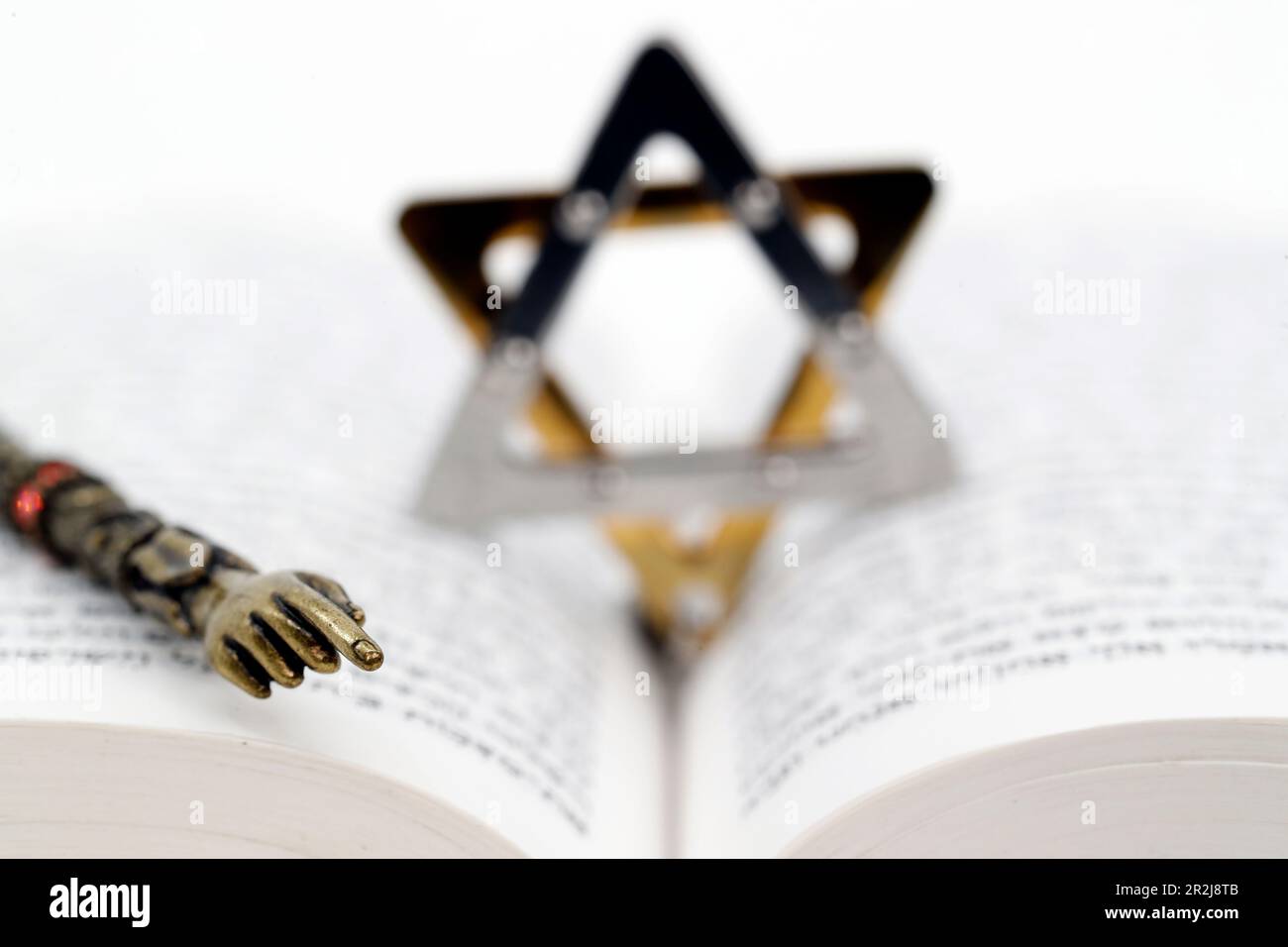 Close-up detail of a Torah in Hebrew, Star of David and a yad, Jewish symbols, France, Europe Stock Photo