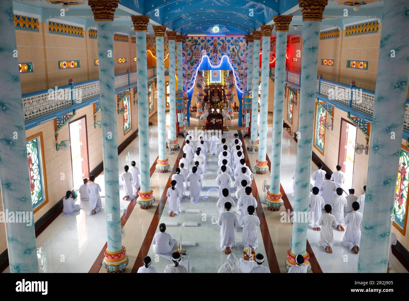 Cao Dai temple, Caodaist worshippers at ceremony, Tan Chau, Vietnam, Indochina, Southeast Asia, Asia Stock Photo