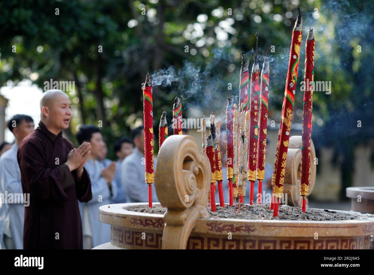 Quan Am Bo Tat temple, Buddhist ceremony, Monk praying, Vung Tau. Vietnam, Indochina, Southeast Asia, Asia Stock Photo