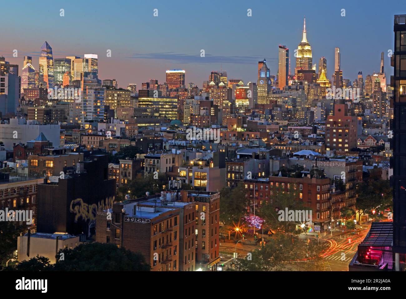 View from the Lower East Side of Bowery Street, the Midtown skyline with the Hudson Yards (left) and the Empire State Building, Manhattan, New York, N Stock Photo