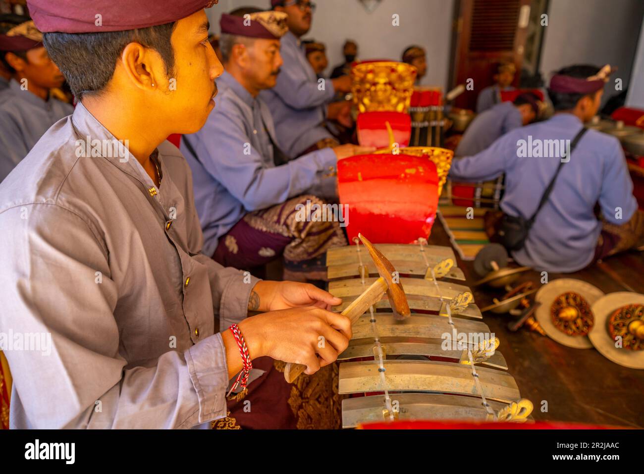 Locals playing Gamelan Saron Gangsa, traditional musical instruments, Ulun Danu Beratan temple on Lake Bratan, Bali, Indonesia, South East Asia, Asia Stock Photo