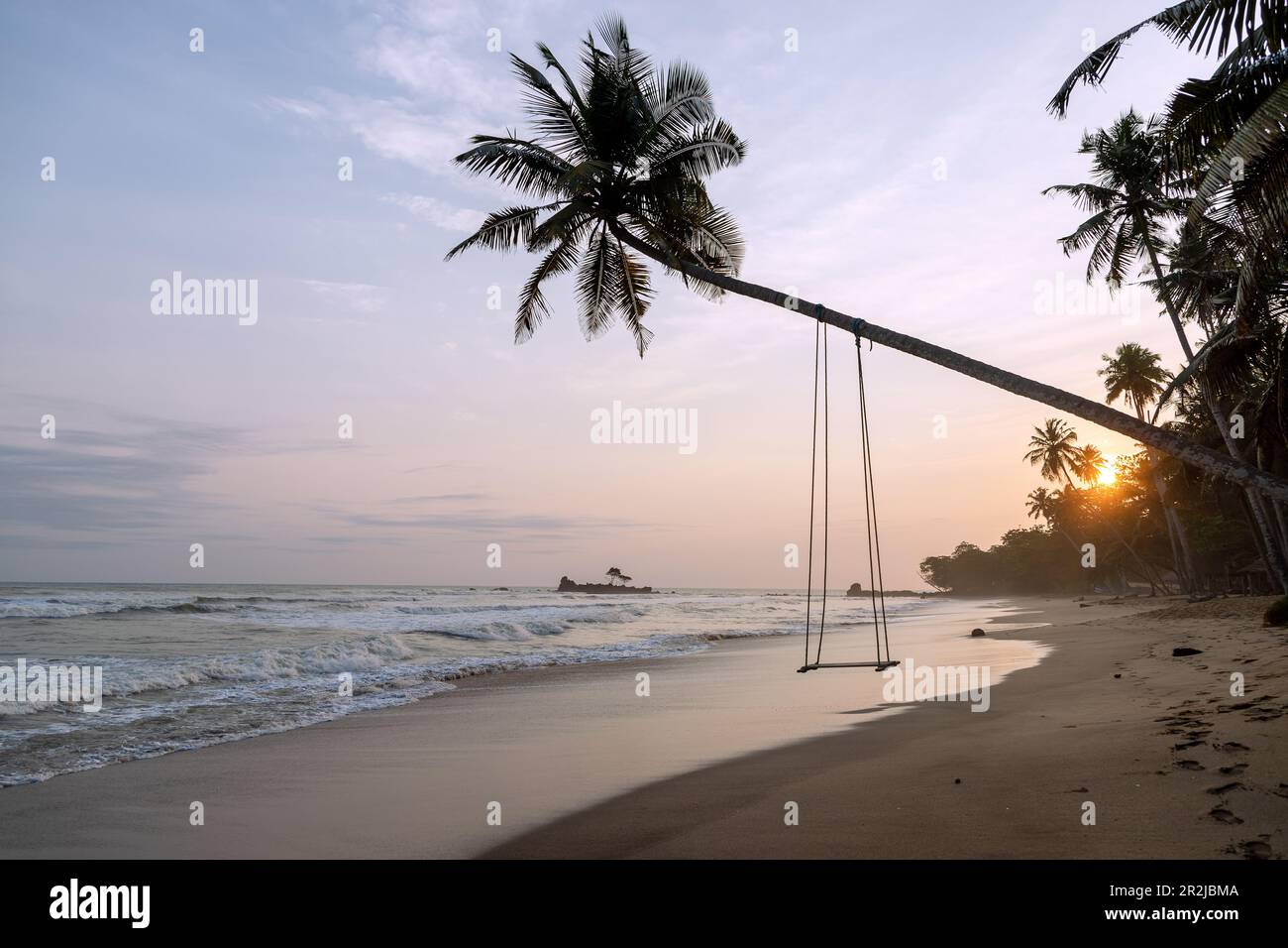 Ankroba Beach with sunset at Axim on the Gold Coast in the Western Region in western Ghana in West Africa Stock Photo