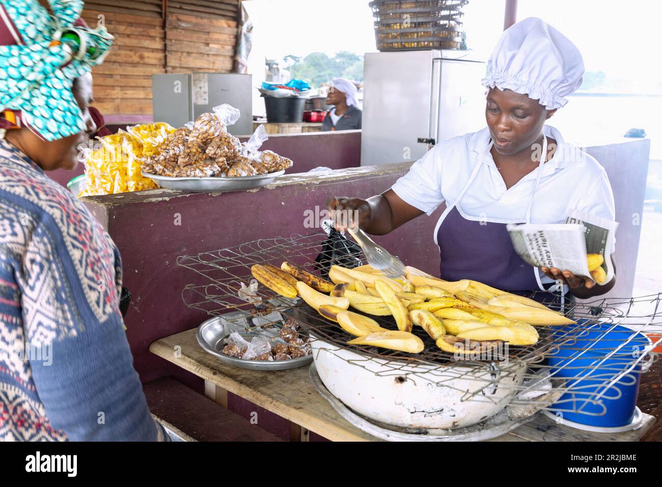 Street Food Stall Selling Grilled Plantains In Ayinam In The Eastern street-food-stall-selling-grilled-plantains-in-ayinam-in-the-eastern