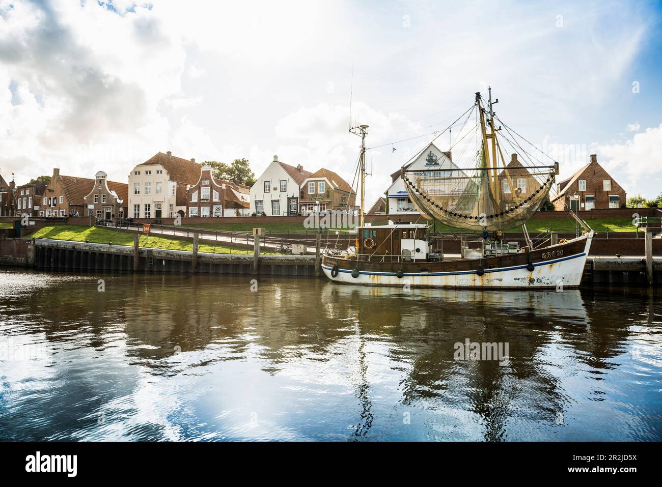 Harbor with shrimp cutters, Greetsiel, East Friesland, Lower Saxony, North Sea, Germany Stock Photo