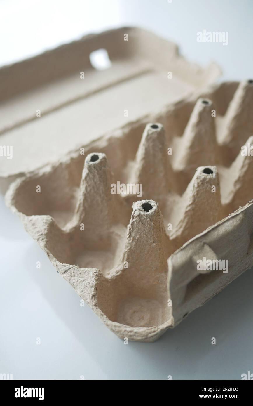 egg carton without eggs on table , Stock Photo