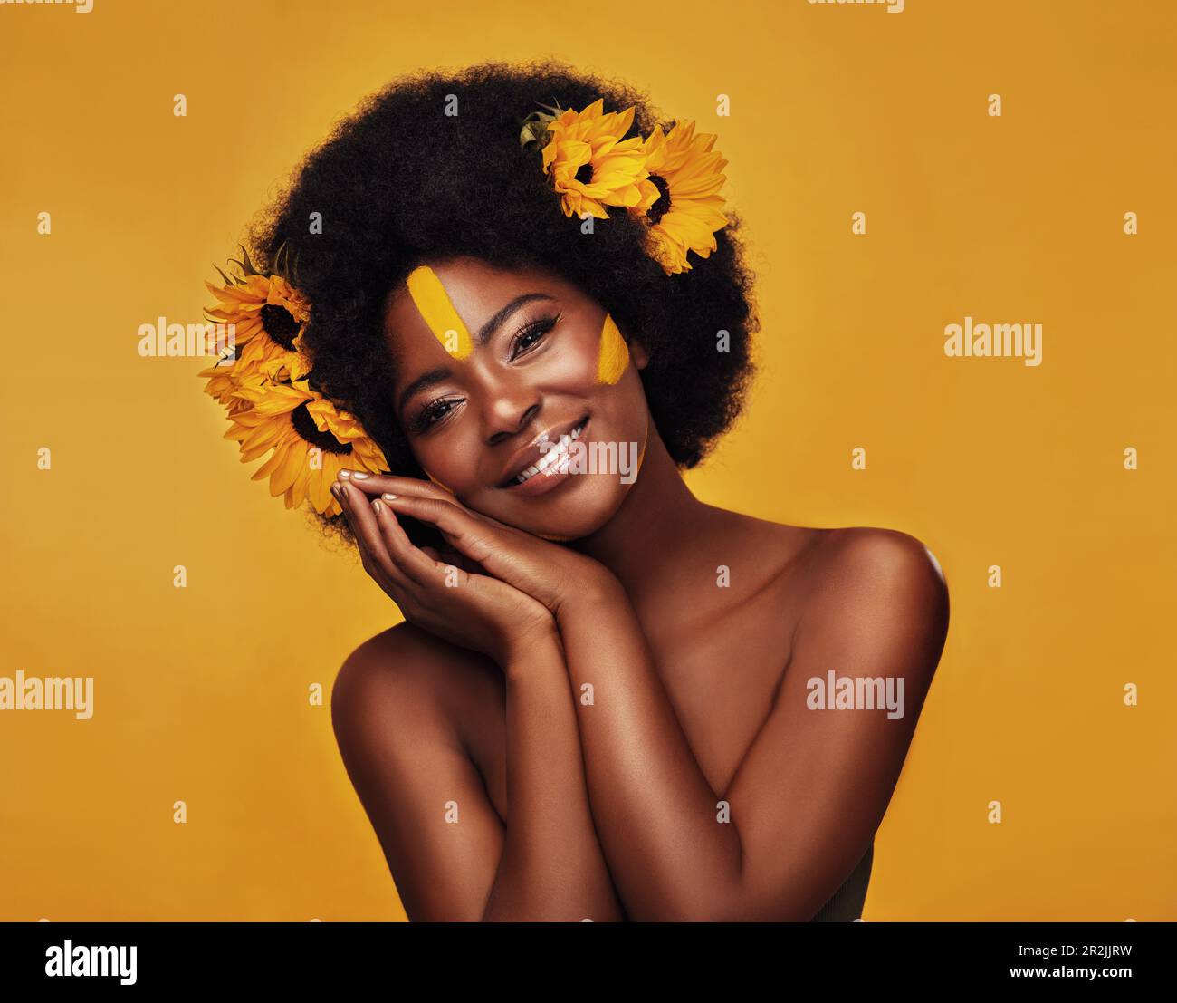 Natural, hair and sunflower with portrait of black woman in studio for ...