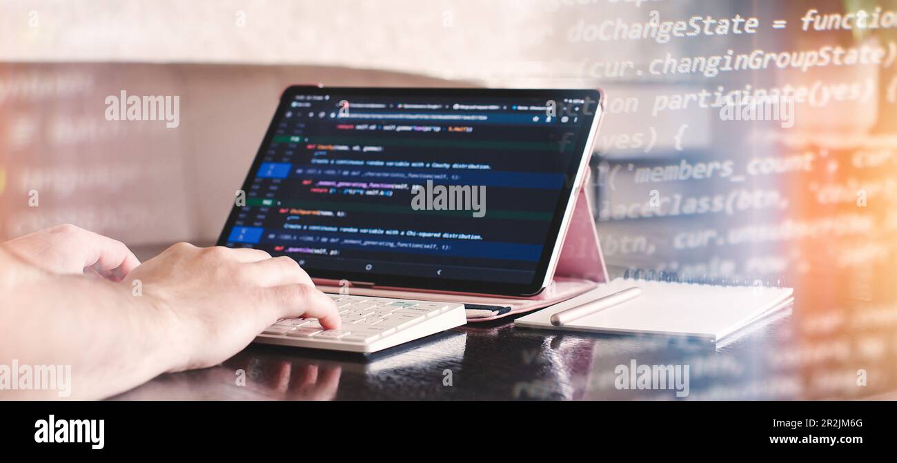 Programmer working on computer code, developer of software applications Stock Photo