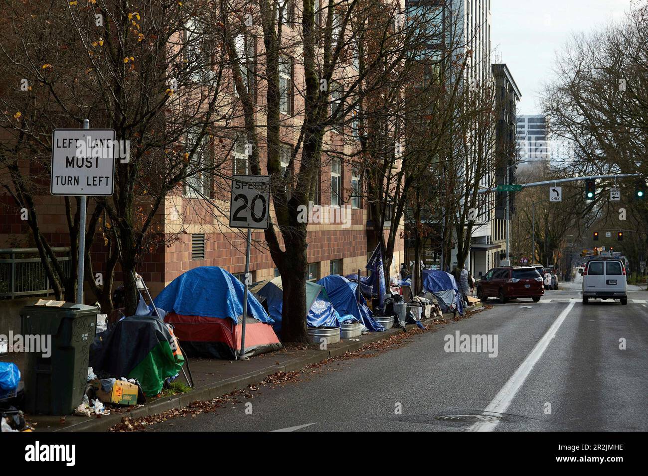 FILE Tents line the sidewalk on SW Clay St in Portland, Ore., on Dec
