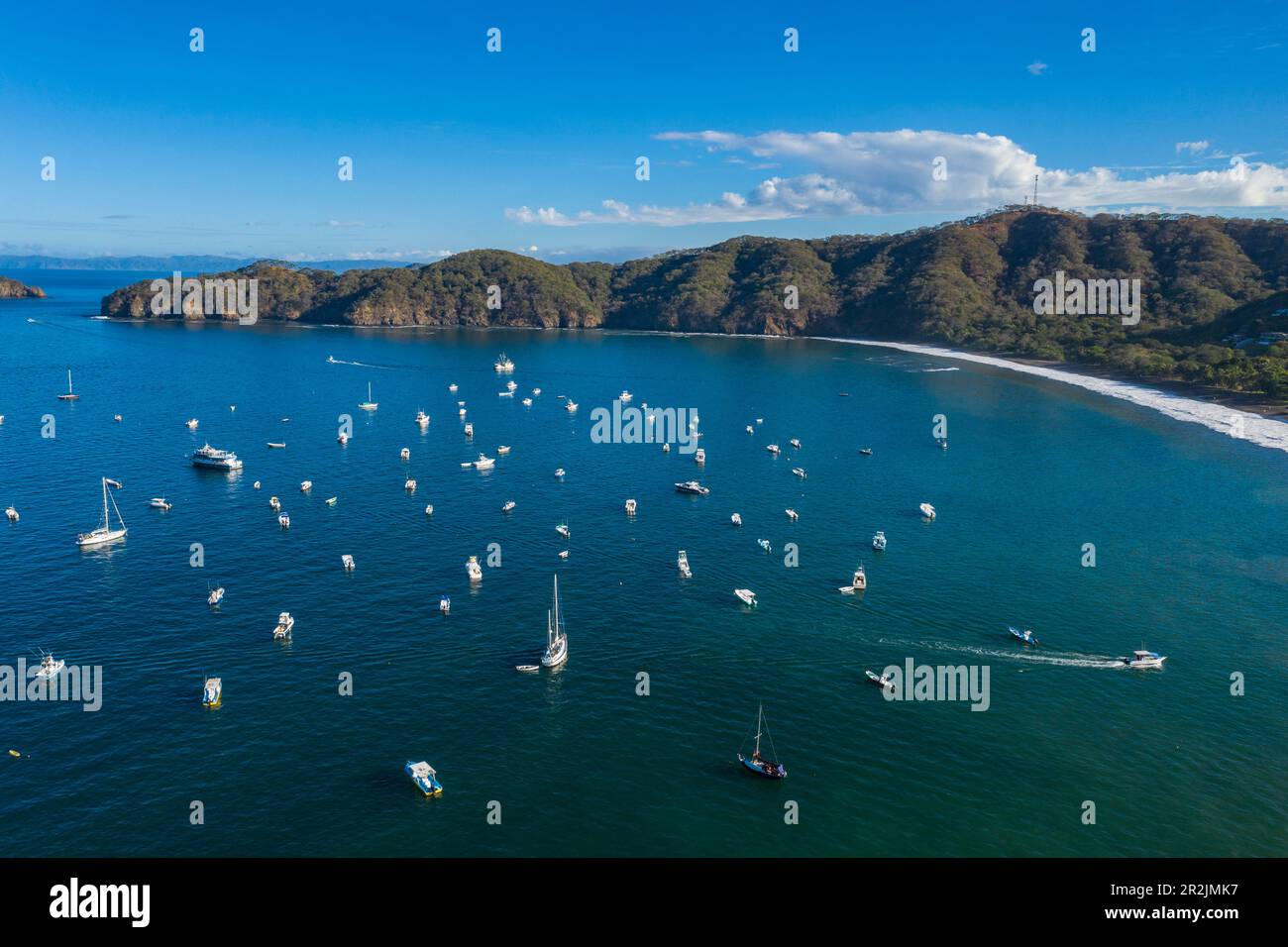 Aerial view of sailboats in bay with coastline behind, Playas del Coco, Guanacaste, Costa Rica, Central America Stock Photo