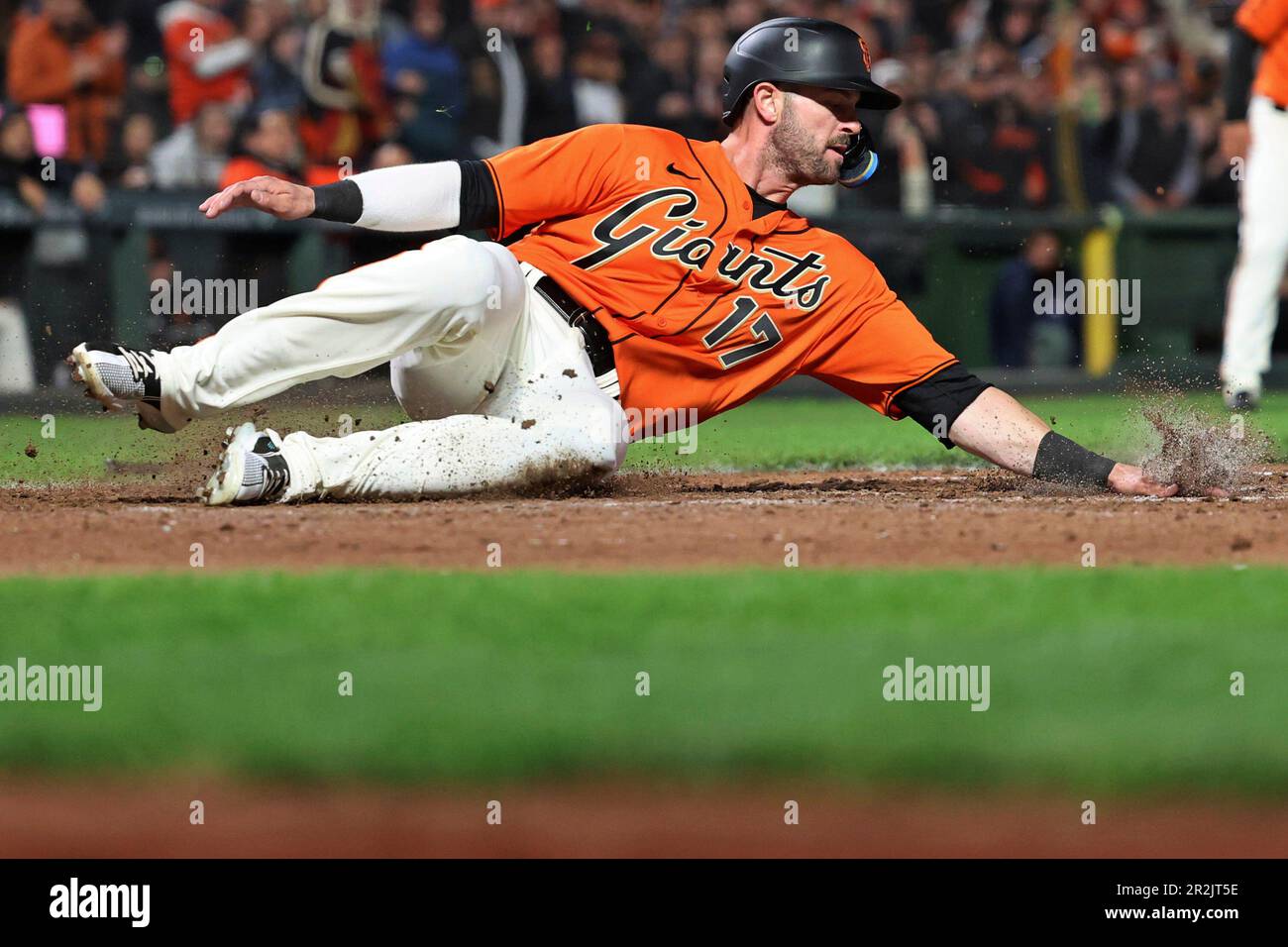 San Francisco Giants' Mitch Haniger scores on a single by Casey Schmitt  against the Miami Marlins during the sixth inning of a baseball game in San  Francisco, Friday, May 19, 2023. (Santiago