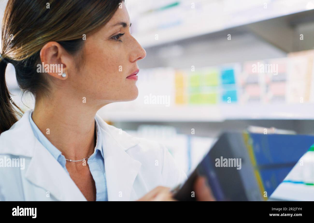 Pharmacy clipboard, store shelf and woman check, search and doing inventory stock take of pills, supplements or medicine. Healthcare shop Stock Photo