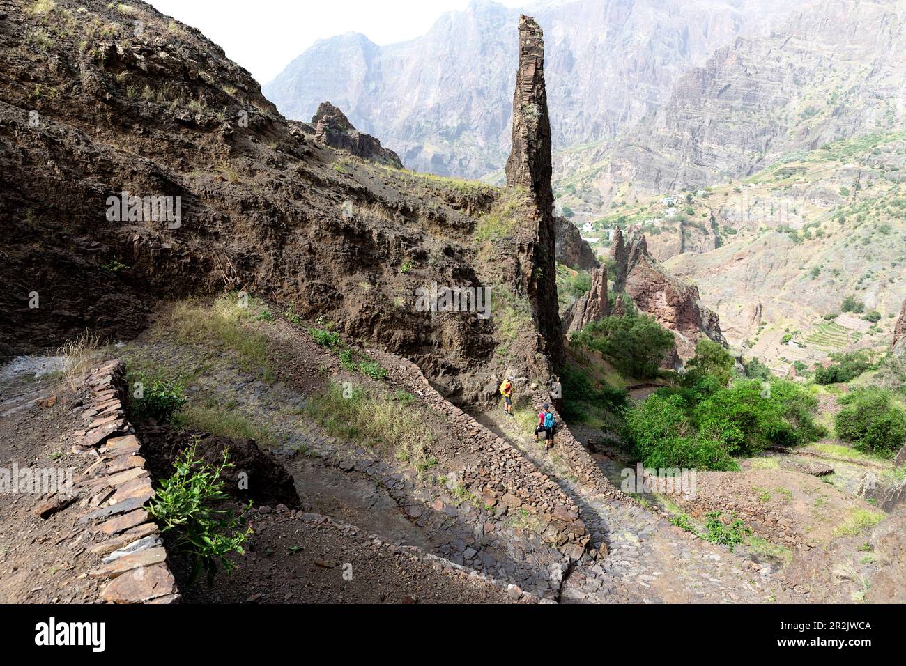 Mother and son, tourists, hikers on a spectacular hiking trail to Cha de Morte village on Santo Antao island, Cabo verde, africa Stock Photo