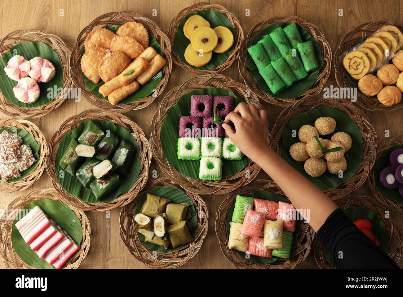 Various Colorful Jajan Pasar, Traditional Indonesian Snack. Female