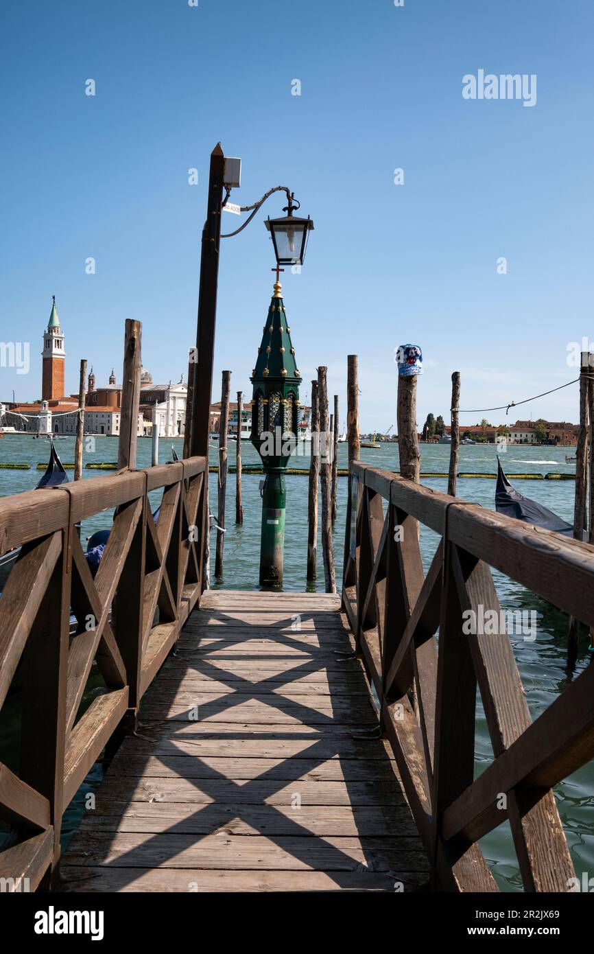 View of the lantern of the gondola station on St. Mark's Square in the background the island of San Giorgio, Venice, Veneto, Italy, Europe Stock Photo