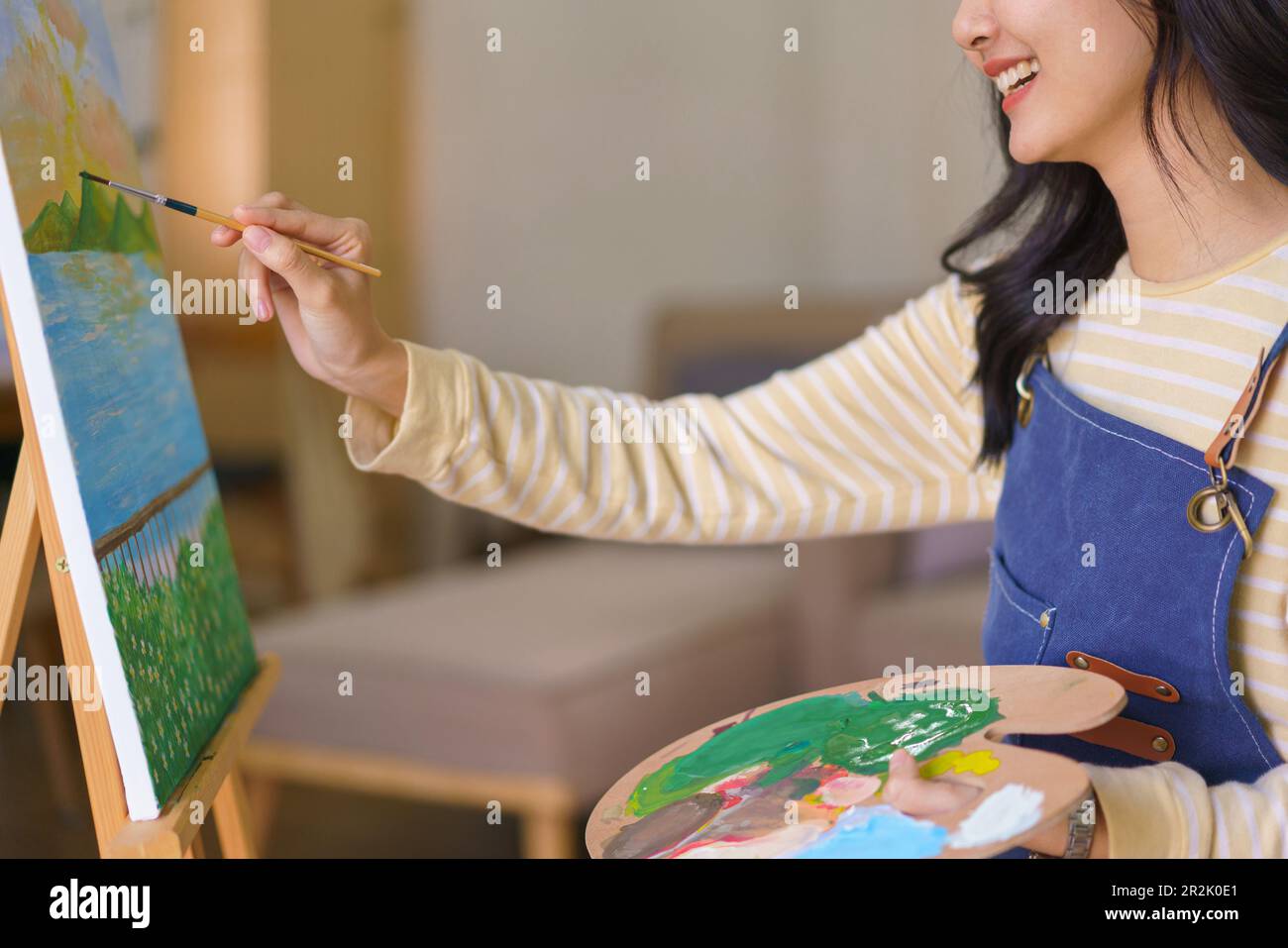 Painting easel and asian female hi-res stock photography and images - Alamy