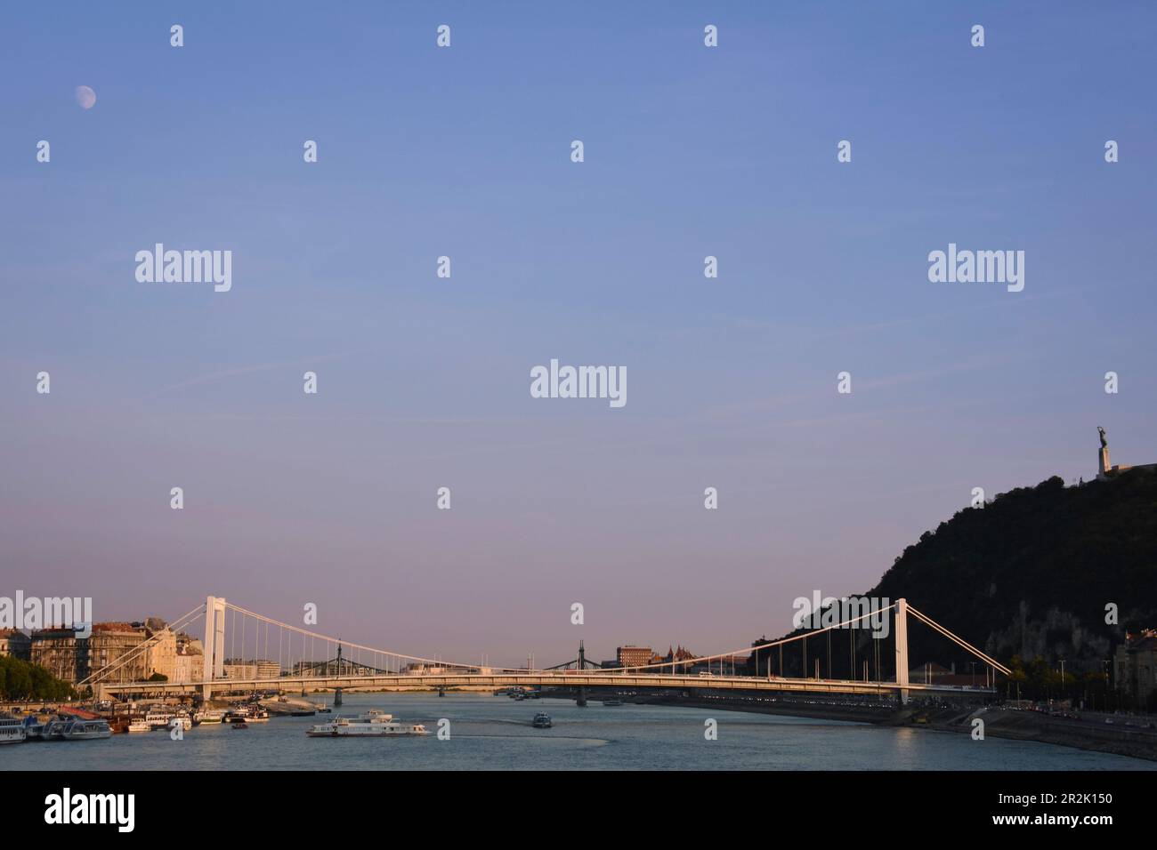 The Moon, the Bridge and the Citadel - Budapest, Hungary Stock Photo