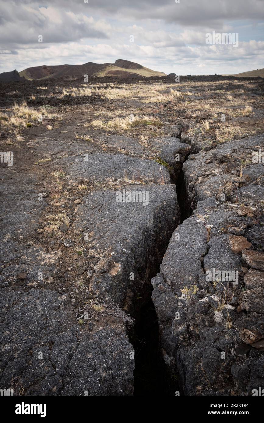 Crack in volcanic rock, Pali Aike Volcanic Field National Park, Patagonia, Santa Cruz Province, Chile, South America Stock Photo