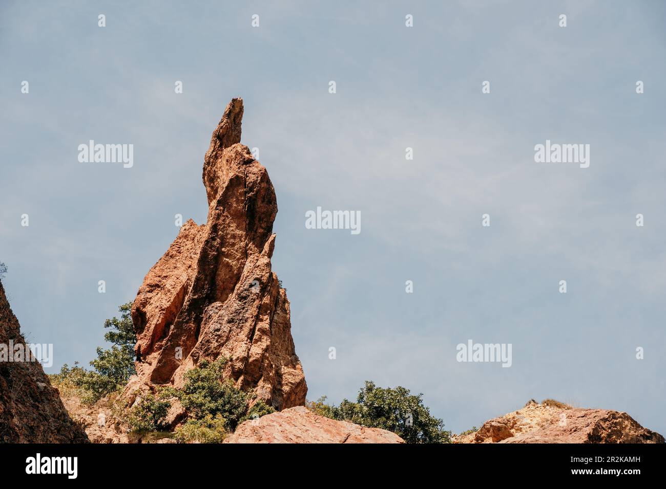 A close up of rocks that look like the beak of a bird or a sharp nose ...