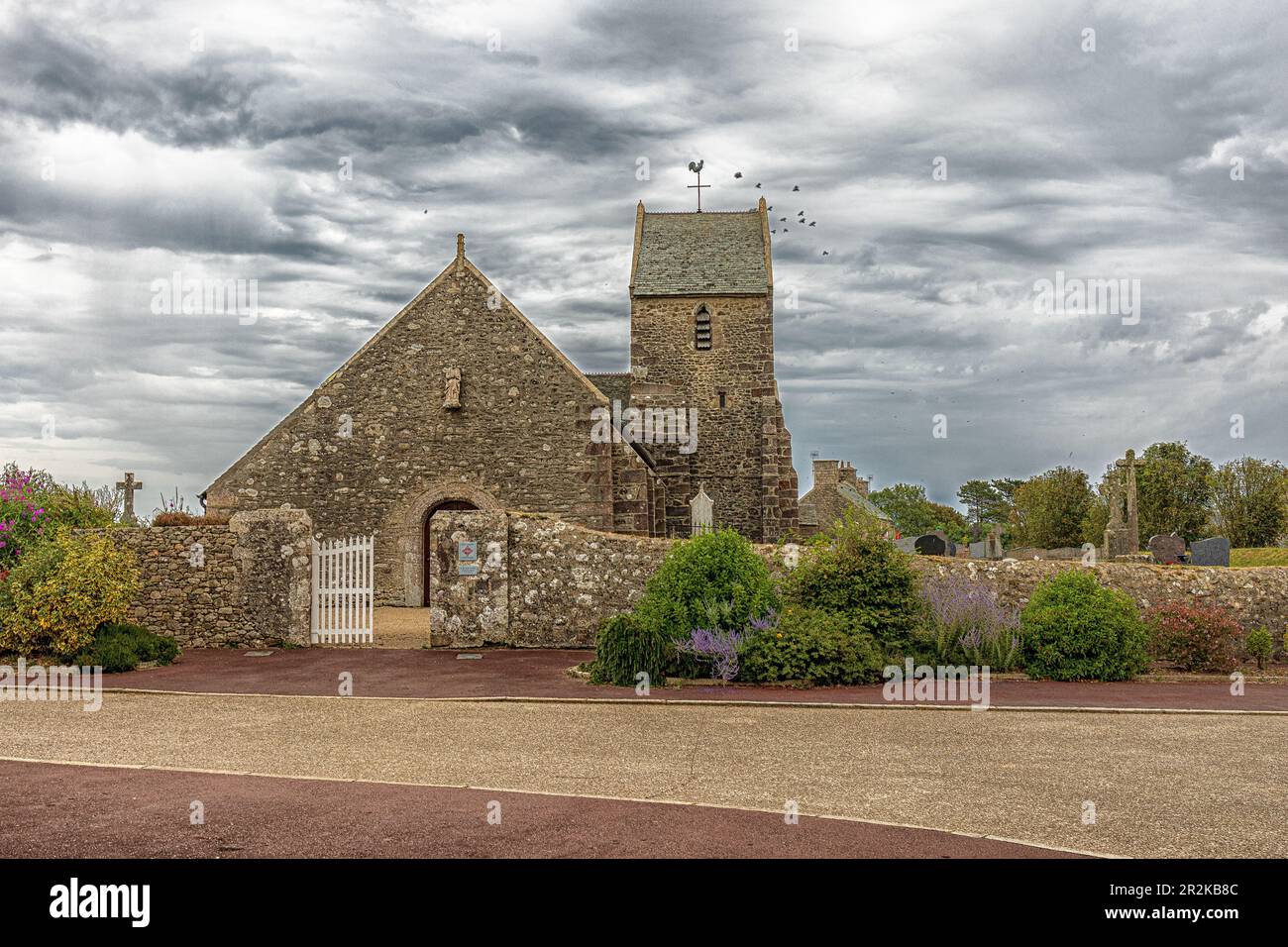 Church tower was built in 1554 and is a listed building. Stock Photo