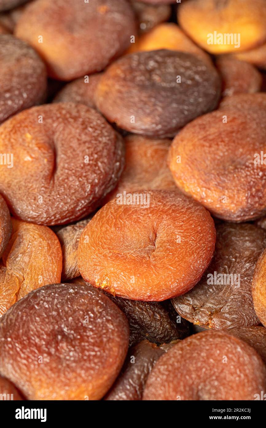 Dried apricots. Naturally dried apricots close up food background