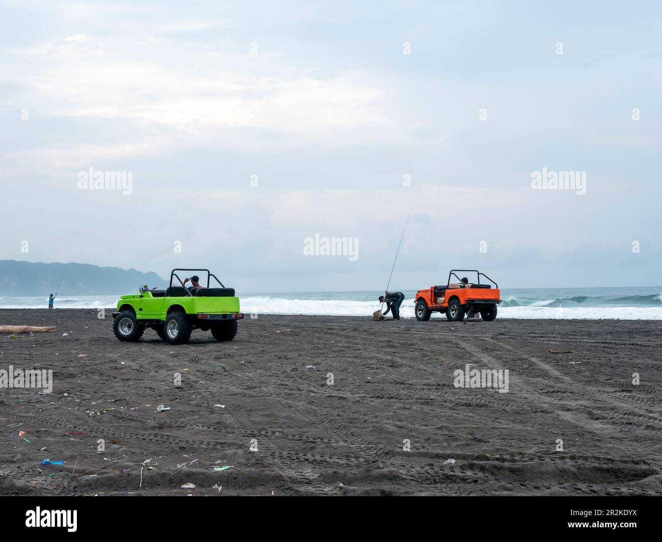 Colorful cars for tourists on Parangtritis Beach, Yogyakarta, Indonesia Stock Photo
