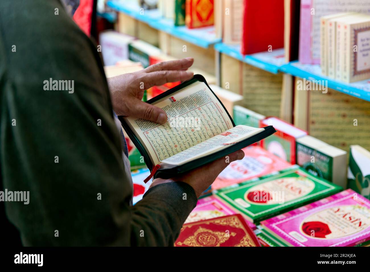 Istanbul Turkey. Reading holy book in a bookshop Stock Photo