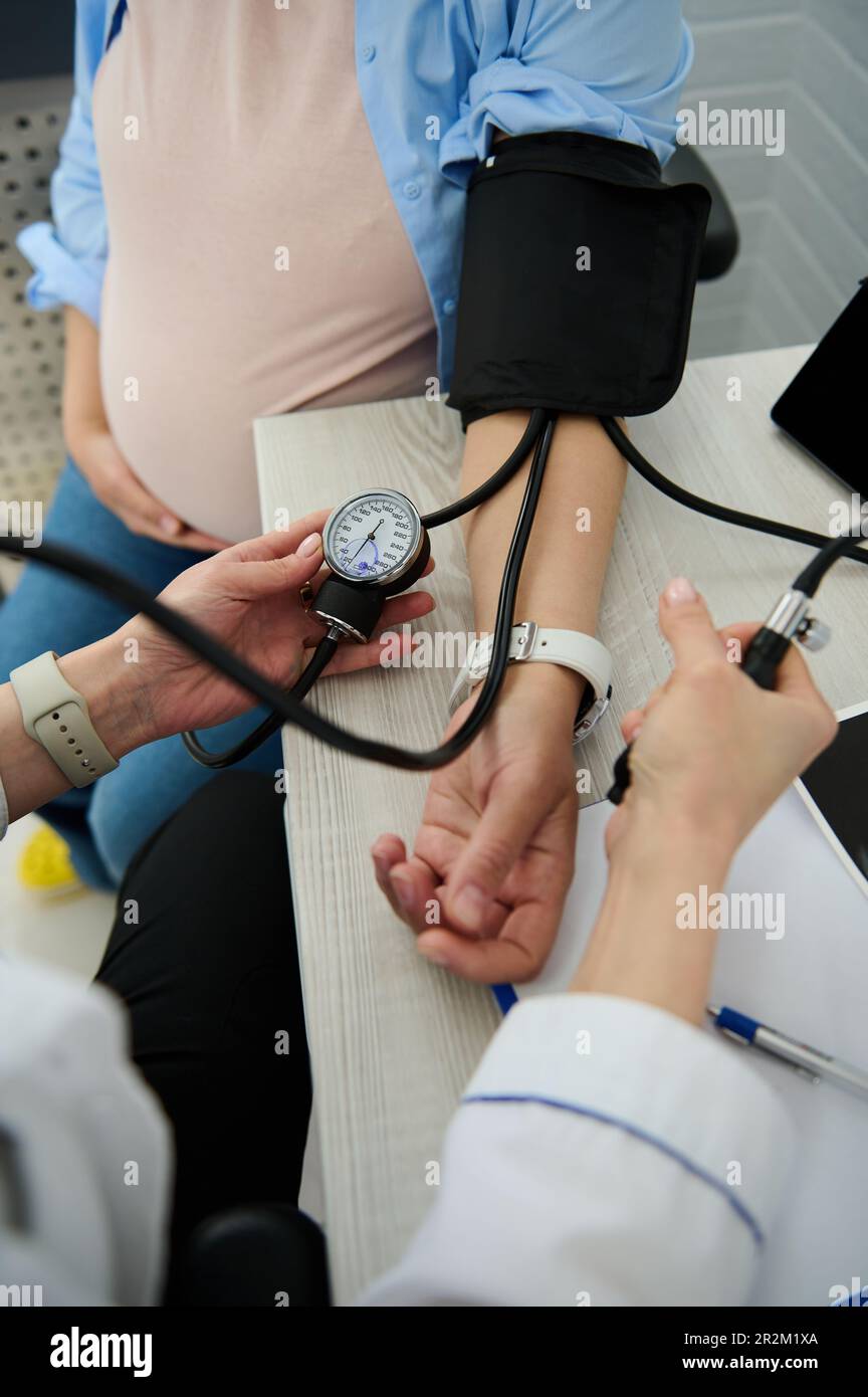 Hypertension, preeclampsia and eclampsia in pregnancy. Closeup doctor