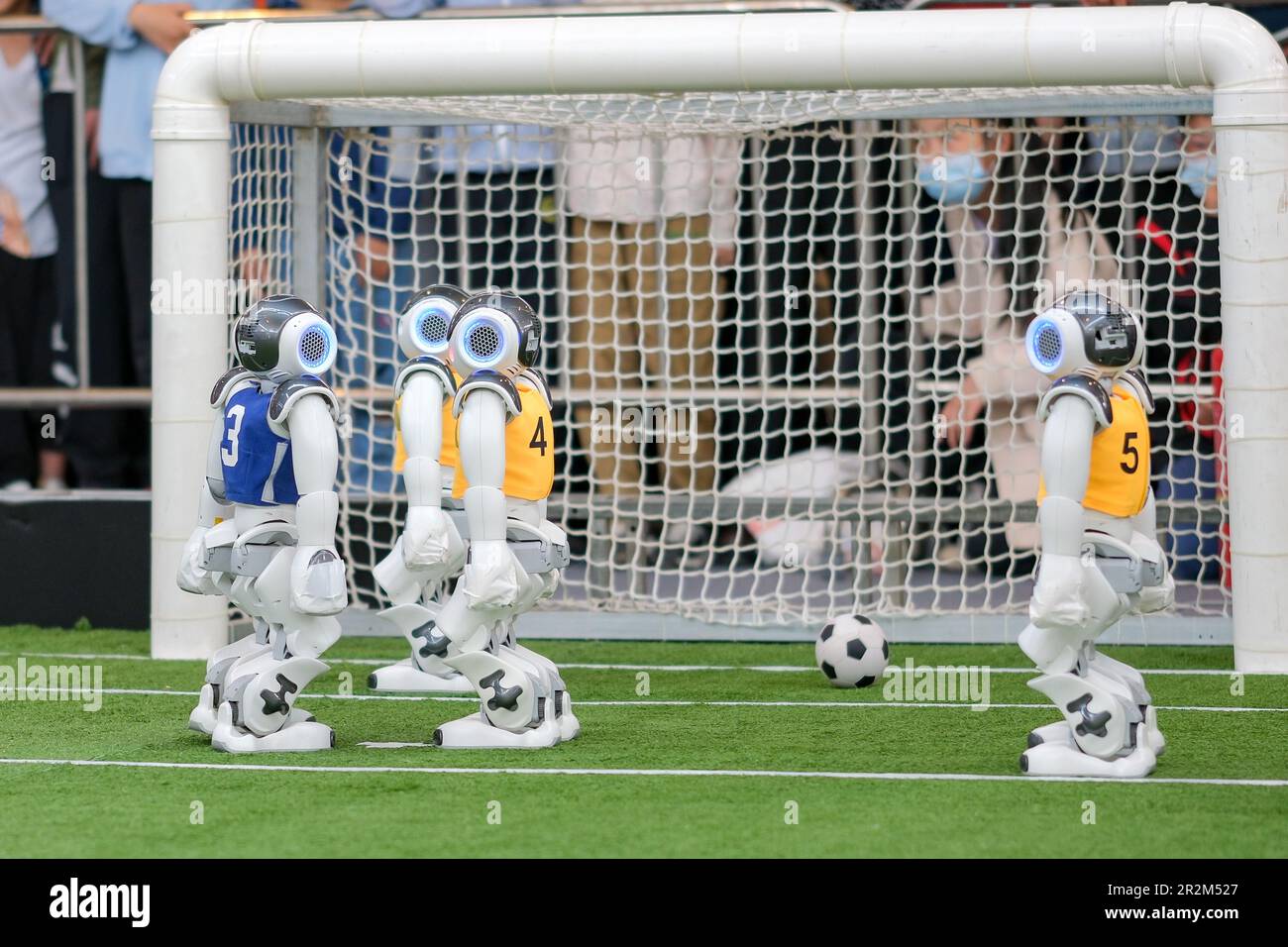 Tianjin. 20th May, 2023. This photo taken on May 20, 2023 shows robots competing in a football game during the seventh World Intelligence Congress (WIC) in north China's Tianjin. The WIC, a major artificial intelligence (AI) event in China, kicked off here on Thursday. Credit: Zhang Cheng/Xinhua/Alamy Live News Stock Photo