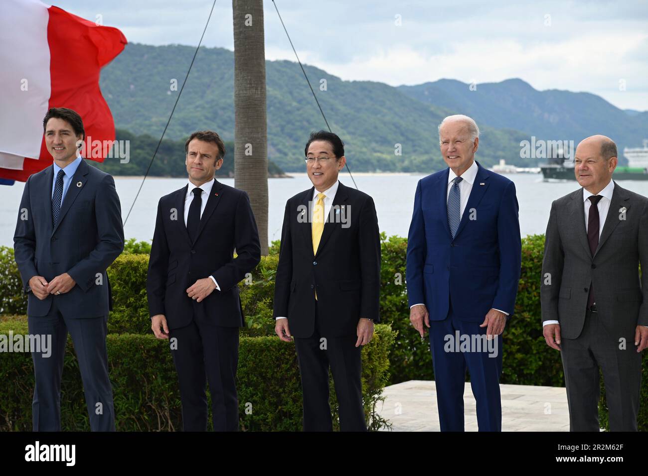 Hiroshima, Japan. 20th May, 2023. Members of the Group of Seven leaders pose together for the official family photo on the second day of the G7 Summit at the Grand Prince Hotel, May 20, 2023 in in Hiroshima, Japan. Standing from left: Canadian Prime Minister Justin Trudeau, French President Emmanuel Macron, Japan Prime Minister Fumio Kishida, U.S. President Joe Biden, and German Chancellor Olaf Schotz. Credit: Pool Photo/G7 Hiroshima/Alamy Live News Stock Photo
