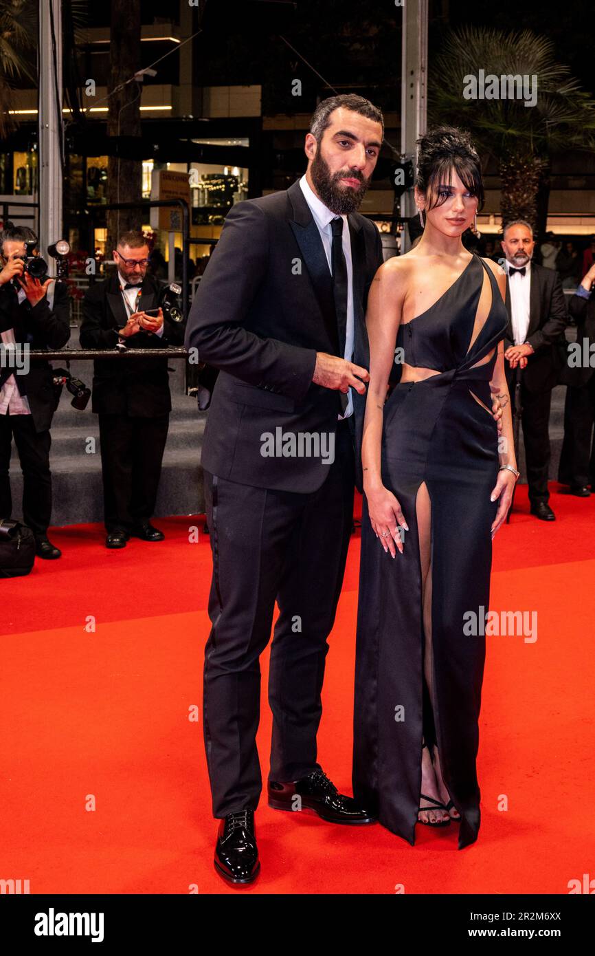 Cannes, France. 20th May, 2023. English singer Dua Lipa and her new  boyfriend French film director Romain Gavras walk the red carpet for 'Omar  La Fraise' at 76th Annual Cannes Film Festival