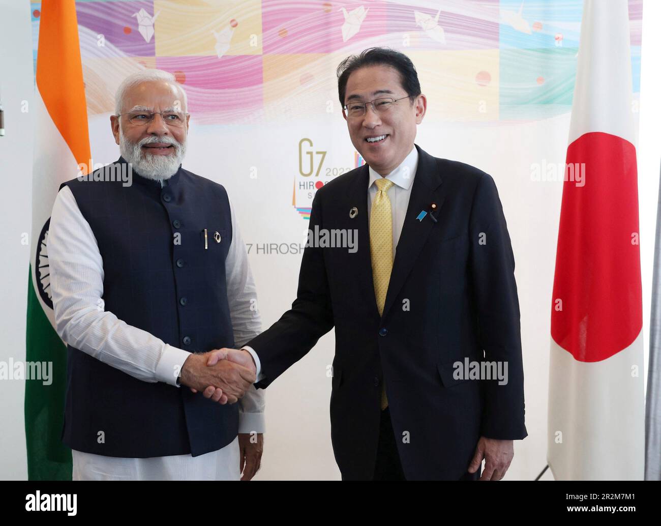 Hiroshima, Japan. 20th May, 2023. Indian Prime Minister Narendra Modi, left, shakes hands with Japanese Prime Minister Fumio Kishida, right, before the start of their bilateral meeting on the sidelines of the G7 Summit meeting at the Grand Prince Hotel, May 20, 2023 in in Hiroshima, Japan. Credit: Pool Photo/Press Information Bureau/Alamy Live News Stock Photo