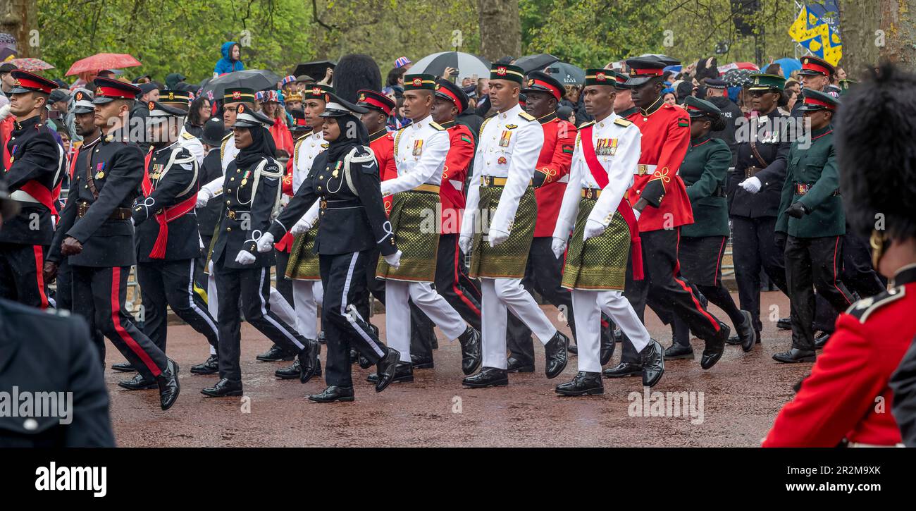 Commonwealth soldiers marching in The Mall for the Coronation of King Charles III Stock Photo