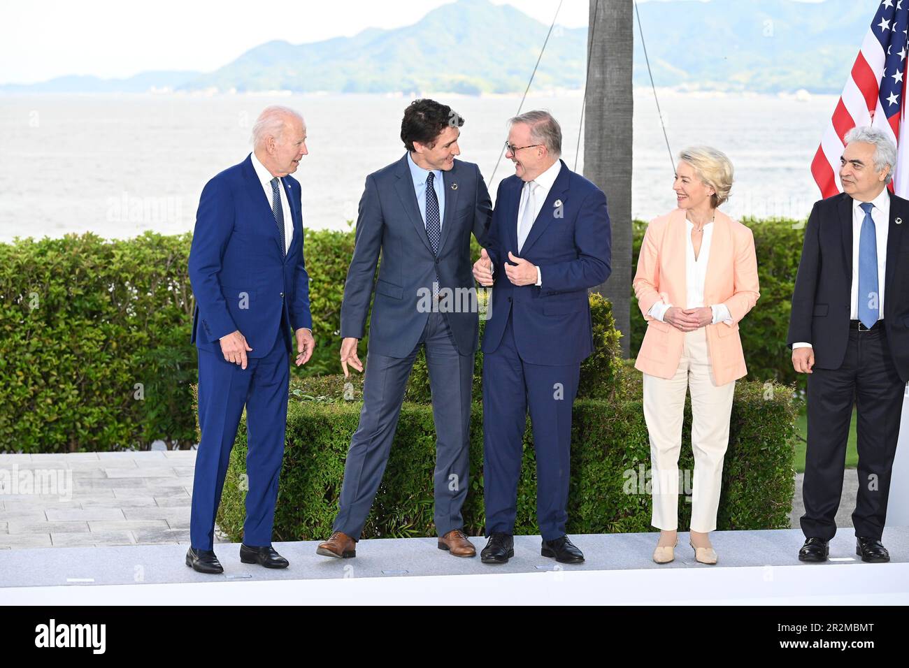 Hiroshima, Japan. 20th May, 2023. Canadian Prime Minister Justin Trudeau, 2nd left, jokes with Australian Prime Minister Anthony Albanese, center, as U.S President Joe Biden, left, European Commission President Ursula von der Leyen, 2nd right, and International Energy Agency Fatih Birol, right, look on following the official family photo of the G7 Summit at the Grand Prince Hotel, May 20, 2023 in in Hiroshima, Japan. Credit: Pool Photo/G7 Hiroshima/Alamy Live News Stock Photo
