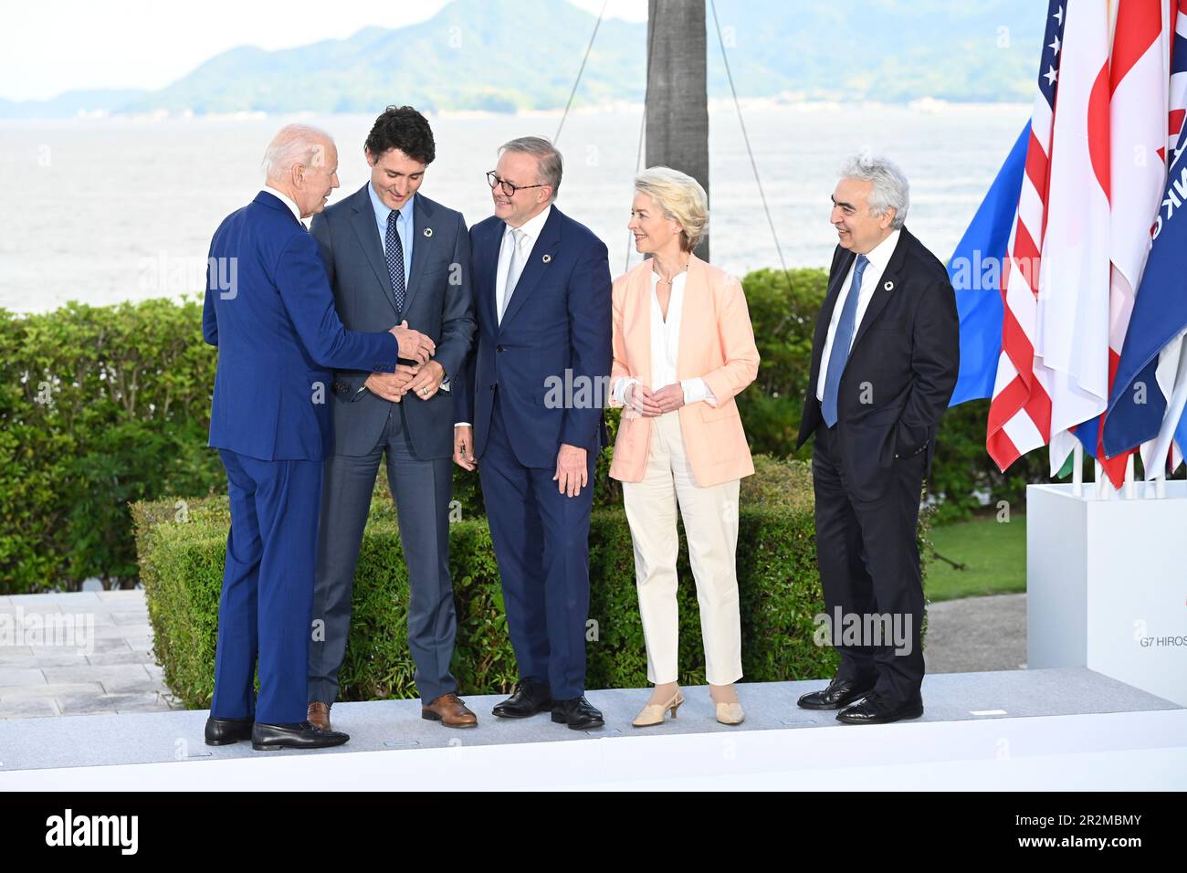 Hiroshima, Japan. 20th May, 2023. U.S. President Joe Biden, left, chats with Canadian Prime Minister Justin Trudeau, 2nd left, Australian Prime Minister Anthony Albanese, center, European Commission President Ursula von der Leyen, 2nd right, and International Energy Agency Fatih Birol, right, following the official family photo of the G7 Summit at the Grand Prince Hotel, May 20, 2023 in in Hiroshima, Japan. Credit: Pool Photo/G7 Hiroshima/Alamy Live News Stock Photo