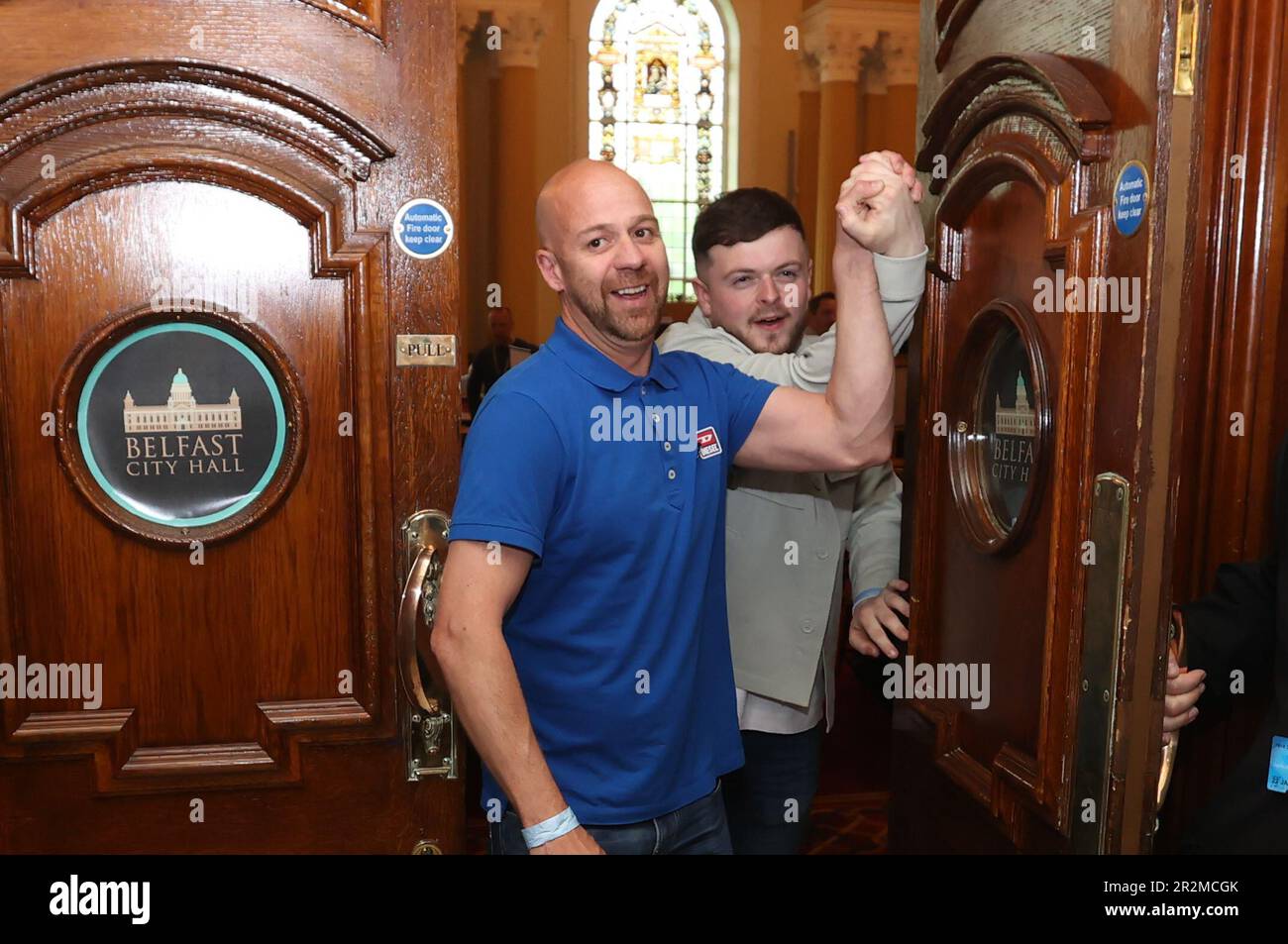 Joe Duffy (left) and Caoimhin McCann from Sinn Fein at Belfast City Hall during in the Northern Ireland council elections. Picture date: Saturday May 20, 2023. Stock Photo