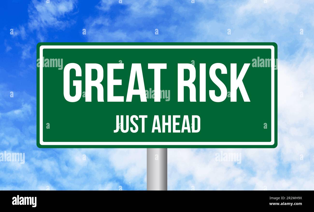 Great Risk just ahead road sign on sky background Stock Photo - Alamy
