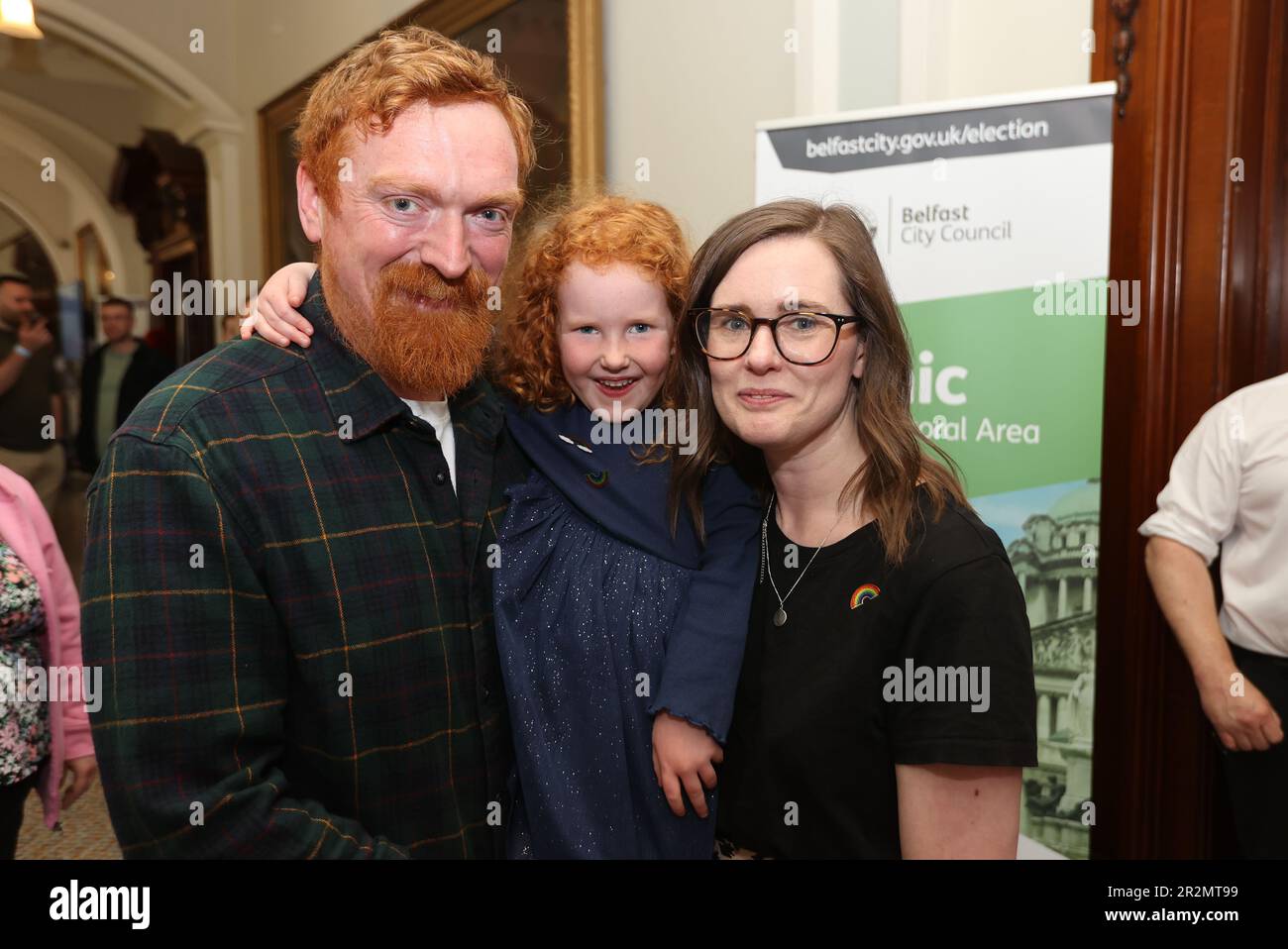 Alliance Party candidate Fiona McAteer with husband Richard McMeekin and daughter 5 year old Emmie at Belfast City Hall during the Northern Ireland council elections Picture date: Saturday May 20, 2023. Stock Photo