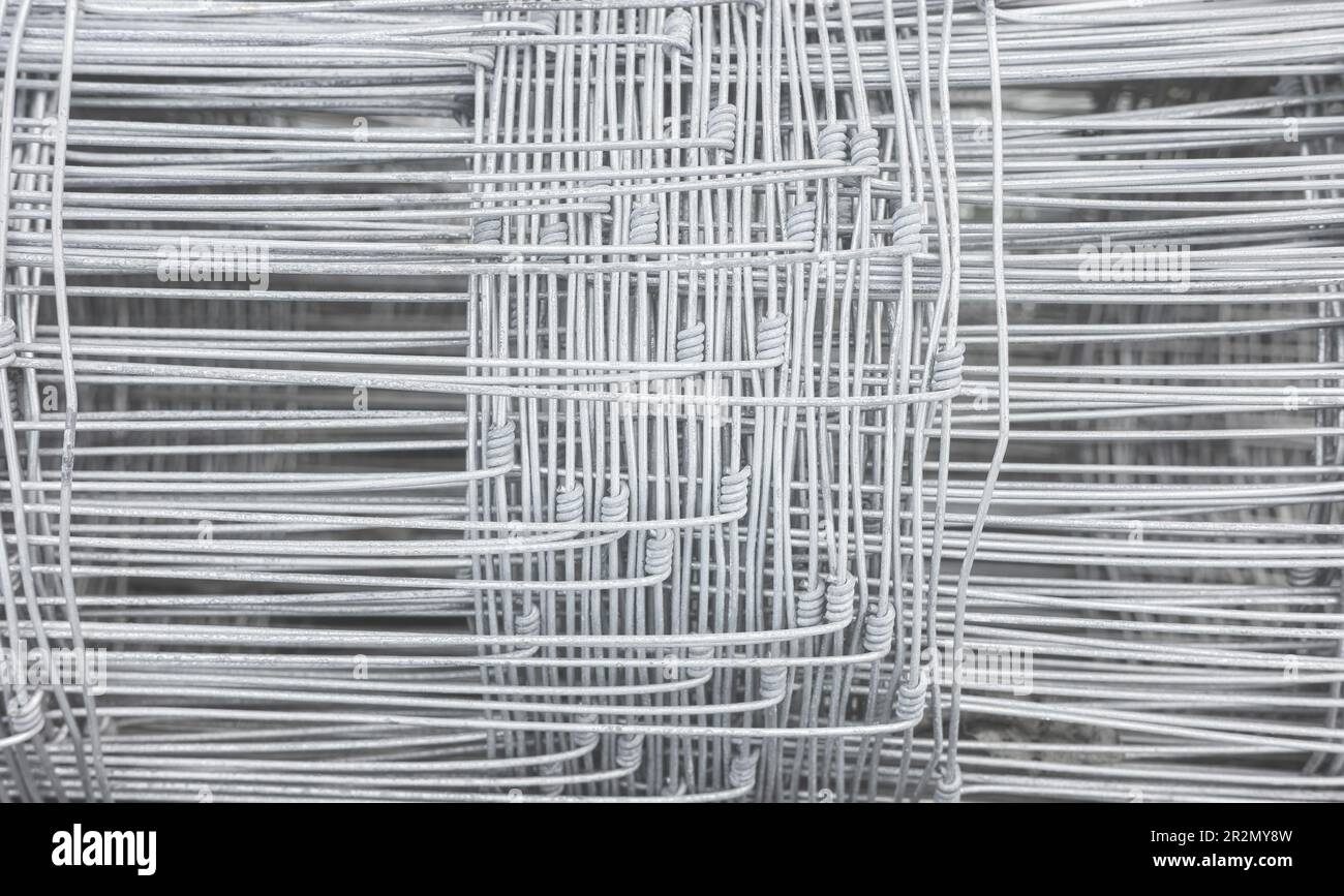 Mesh wire bundle abstract background, selective focus. Stock Photo
