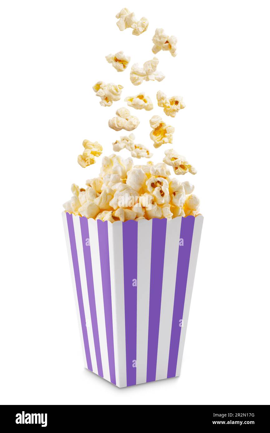 Popcorn flying out of purple white striped paper box isolated on white