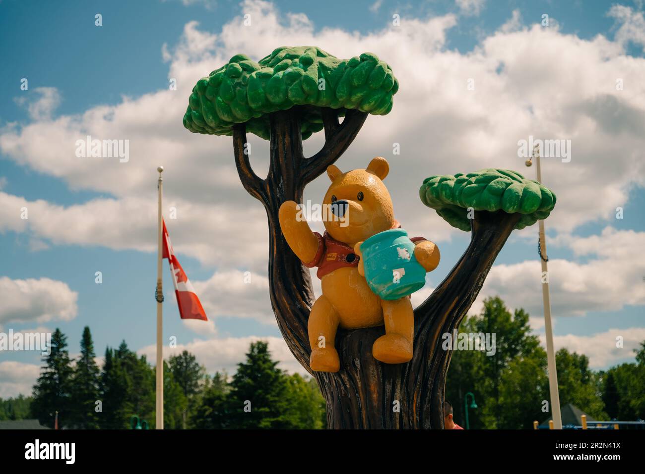 WHITE RIVER, ONTARIO, CANADA - MAY 2023 View of Winnie the Pooh statue in the town of White River. High quality photo Stock Photo