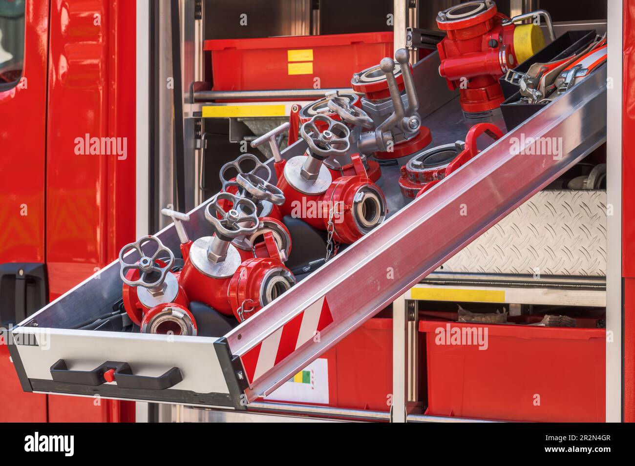 Emergency equipment inside a red fire truck Stock Photo Alamy