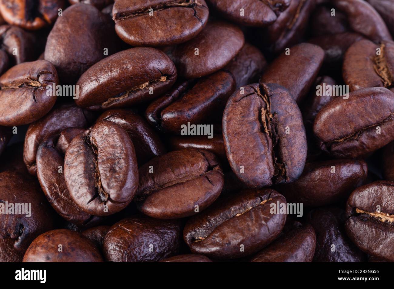 roasted coffee beans isolated on white background Stock Photo - Alamy
